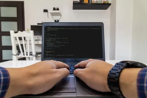 Remote developer concept. Man coding from home 스톡 사진