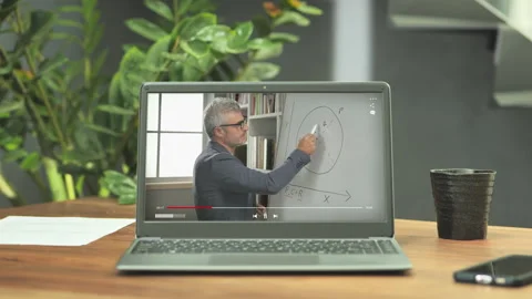 Remote e-learning teacher gives lecture class at the laptop computer screen Stock Footage 280007634