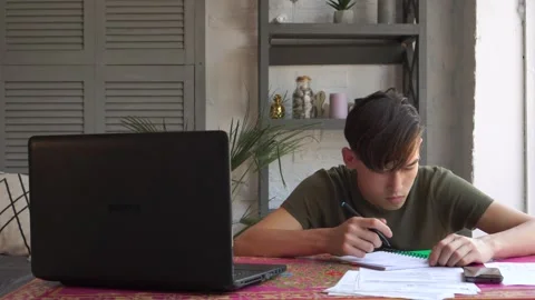 Remote education during coronavirus. Students study at home via the Internet Stock Footage 132432614