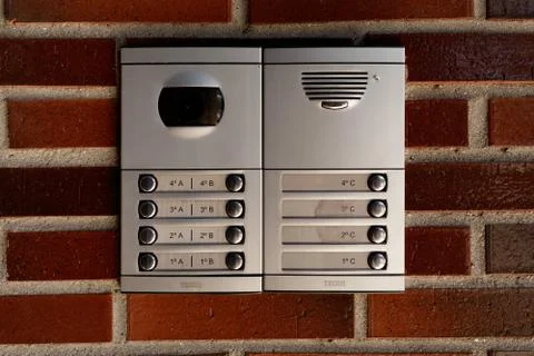 Remote entry keypad on red brick wall Stock Photos