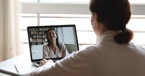 Remote female student elearning during online lesson with web teacher Stock Footage 128191769