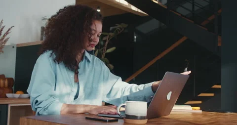 Remote freelance work. Beautiful smiling young African American woman with curly Stock Footage 149207290