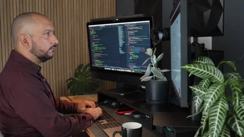 Remote Hispanic IT Programmer Working on Desktop Computer. Male Web Stock Footage 281684631