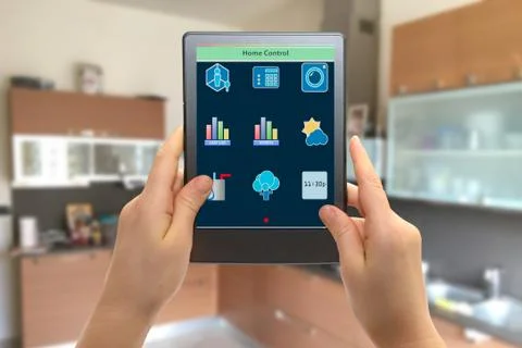 Remote home control system on a digital tablet Stock Photos