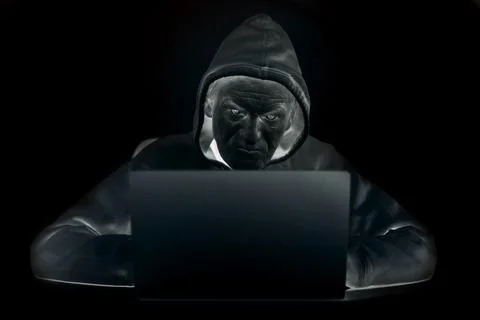 Remote intrusion of computer hacker to bank account of victim Stock Photos