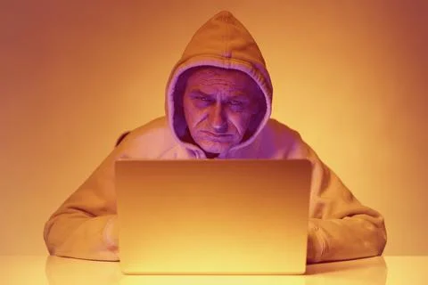 Remote intrusion of computer hacker to bank account of victim Stock Photos