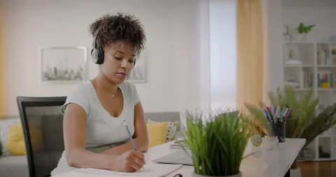 Remote Learning or Webinar Concept at Home Office. Happy African American Woman Stock Footage 166232461