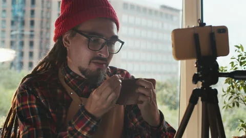 Remote lesson, online learning and video chat on learning to work with leather Stock Footage 140222599