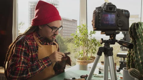 Remote lesson, online learning and video chat on learning to work with leather Stock Footage 140519758