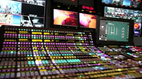 Remote with lots of buttons and manitora in hardware unit TV studio. Stock Footage 46783231
