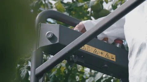 Remote management of a special elevator in the greenhouse Stock Footage 73218846