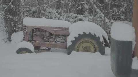 Remote Northern Town Old Tractor In Snow Stock Footage 154049685