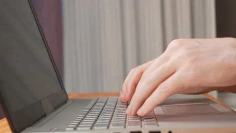 The Remote Programmer Works from Home on a Laptop. The Developer Programs Remote Stock Footage 132634144