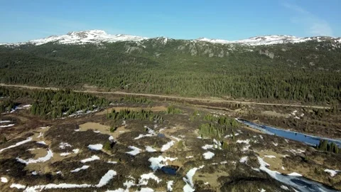 Remote road through mountain landscape, drone shot Stock Footage 289576803