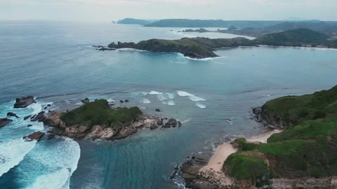Remote Rugged Islands With Powerful Surf And Sharp Shoreline Features Stock Footage 331399576