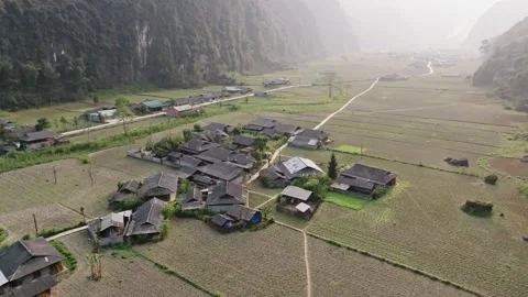 Remote Rural Hamlet Surrounded by Mountain Farmland Stock Footage 345695034