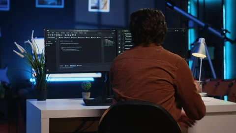 Remote software developer arriving in office at home, starting job shift Stock Footage 265510400