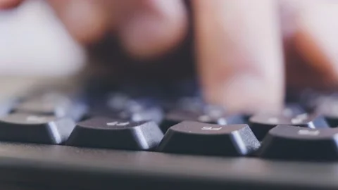 Remote student typing homework on a black keyboard to submit for review. Stock Footage 146549622
