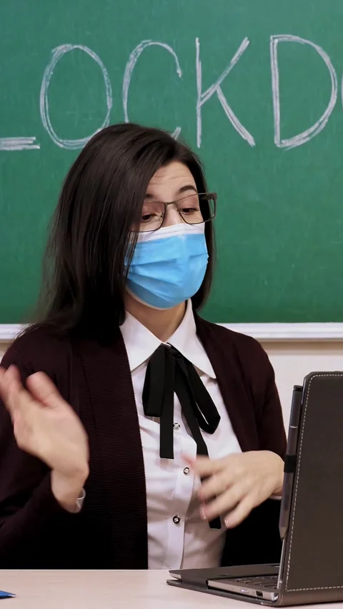 Remote teaching, lockdown at schools. Online schooling, e-learning. Female Stock Footage 317537778