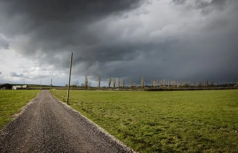 Remote UK farm and a dramatic sky with storm clouds Stock Photos