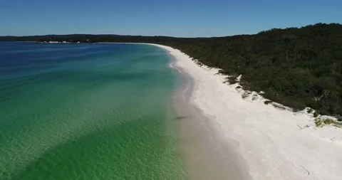 Remote white sand dunes beach on Jervis Bay in Australia – aerial 4k. Stock Footage 139597282