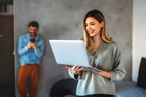 Remote work and digital business. Diverse couple collaborating online, mana.. Stock Photos