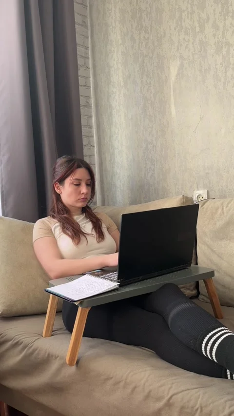 Remote Work and Exam Preparation Woman at Laptop Stock Footage 329319696