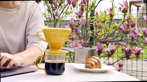 Remote Work and Pour Over Coffee Outdoors on Spring Morning Video stock 334597903