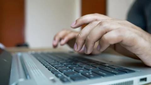 Remote Work Concept: Person Typing on Laptop at Organized Office Desk Stock Footage 315982933