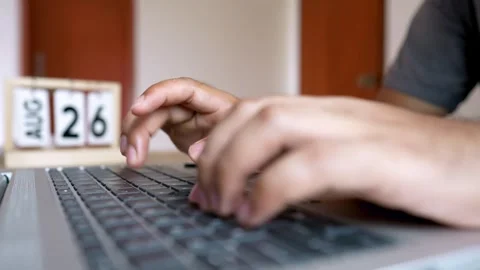Remote Work Concept: Person Typing on Laptop at Organized Office Desk Stock Footage 315982971