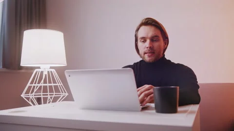 Remote work concept. Young caucasian man having an online meeting. Using laptop Stock Footage 147168797