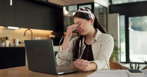 Remote work, headache and woman in kitchen, laptop for online article and news Stock Footage 336658883