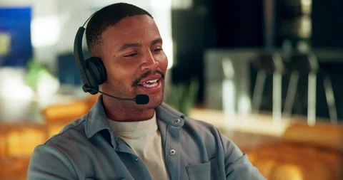 Remote work, headset and black man with computer for telemarketing, talking or Stock Footage 337452200