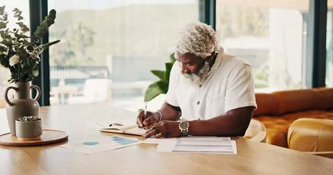 Remote work, home and black man writing on notebook for financial analysis,.. Stock Photos