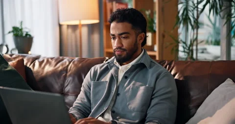 Remote work from home, thinking and man with laptop, choice and copywriting with Stock Footage 314032947