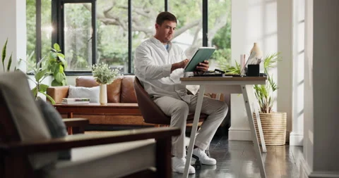 Remote work from home, typing and man with tablet for article submission, Stock Footage 329395078