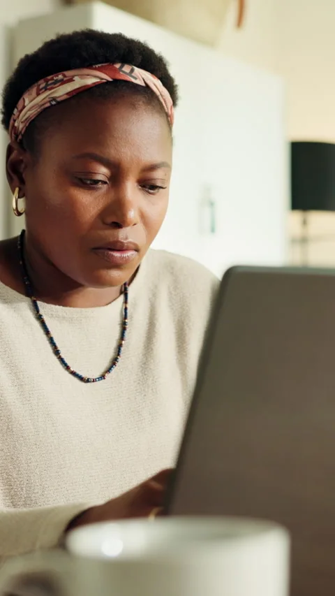 Remote work, laptop and black woman in home for online article, proofreading and Video stock 321866643