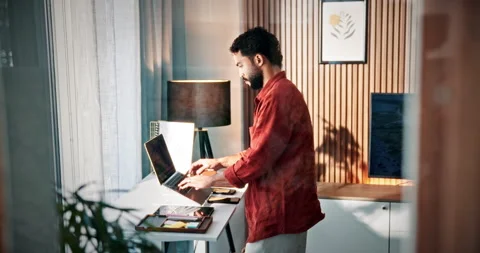 Remote work, laptop and man on treadmill in home for copywriting, editing and Stock Footage 330159108