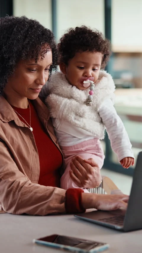 Remote work, laptop and mom with baby in home for research, online project and Stock Footage 335849076