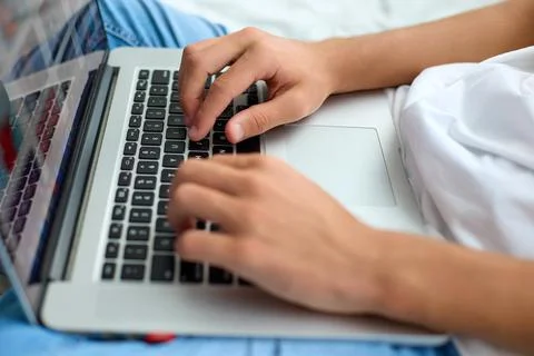 Remote work on a laptop during isolation. Stock Photos