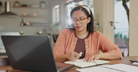 Remote work, laptop or business woman writing in book for home office mind map Stock Footage 306490017