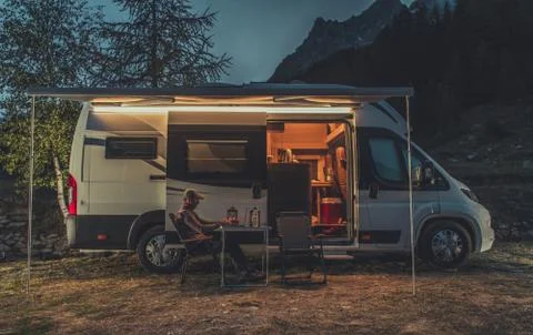 Remote Work on Laptop While Camping in a Wild 스톡 사진