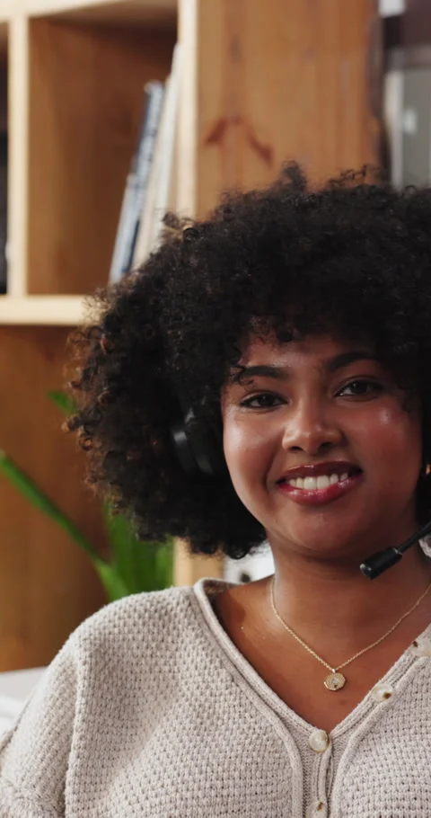 Remote work, laugh and face of black woman with headset for virtual assistant Stock Footage 333753075