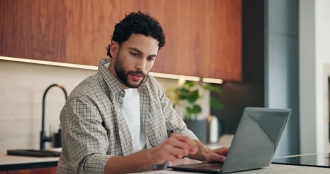 Remote work, man and laptop with review in kitchen for manuscript editing Stock Footage 335104381