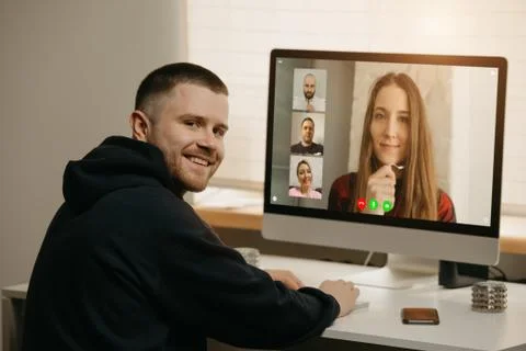 Remote work of a man on the desktop computer Foto stock