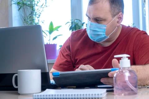 Remote work or distance learning. business man working from home 写真素材