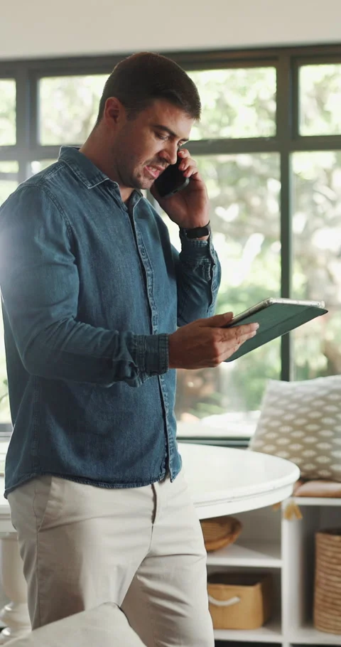 Remote work, phone call and man with tablet for planning, client feedback and Stock Footage 330908914