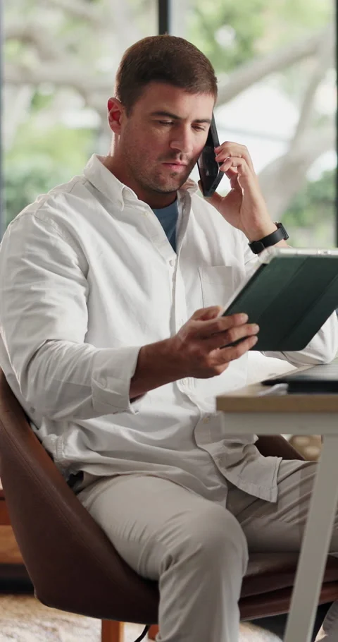 Remote work, phone call and man with tablet for feedback, client review and Stock Footage 330909281