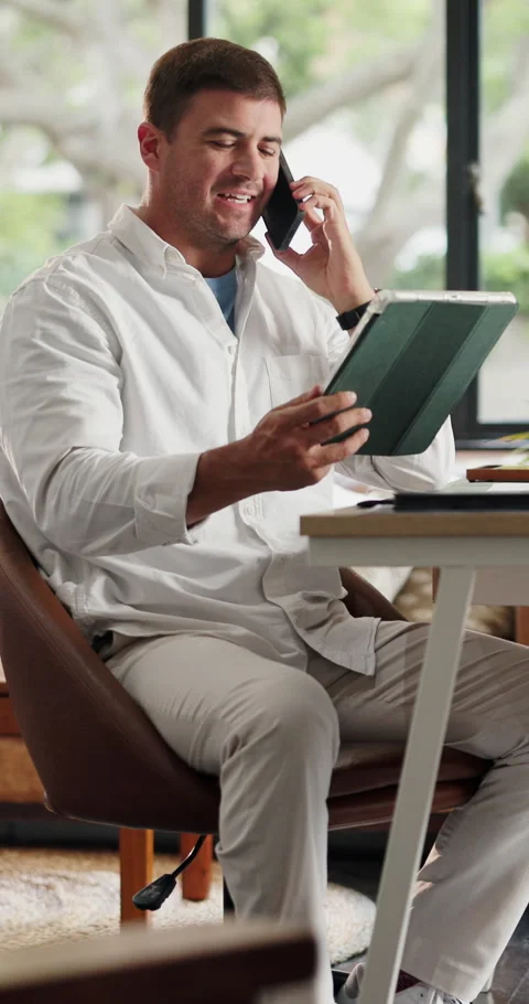 Remote work, phone call and man with tablet for review, client feedback or Stock Footage 330921368
