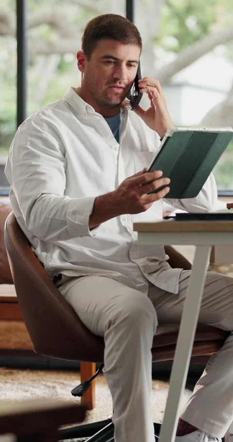 Remote work, phone call and man with tablet at desk, client feedback and Stock Footage 330921425